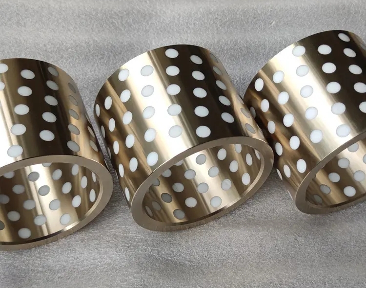 Bronzo di alluminio ZCuAl10Fe5Ni5 intarsiato con cuscinetti in PTFE: cuscinetti autolubrificanti resistenti alla nebbia salina e alla corrosione dell'acqua di mare